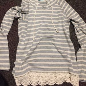 Cute stripe pullover with lace on the end!